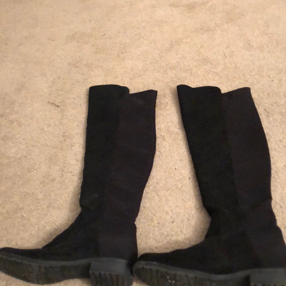 Lightly worn black Unisa boots